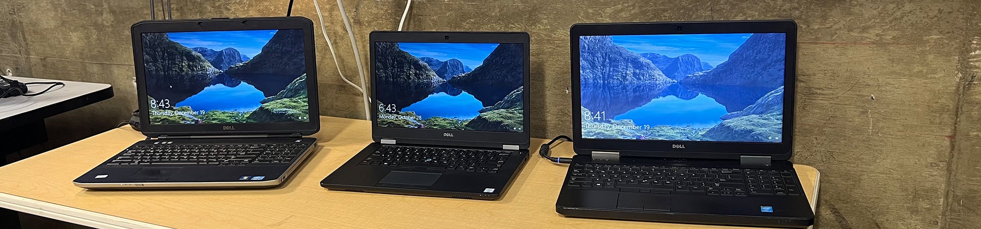 three laptops