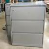 Gray 3-drawer locking cabinets with keys.